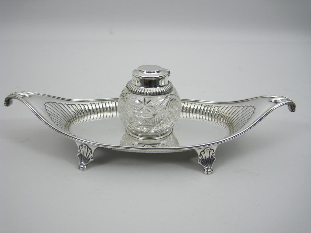 Appraisal: A Victorian oval Inkstand with scroll ends fitted silver mounted