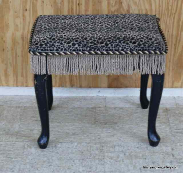 Appraisal: Leopard Fabric Tassel Covered Foot StoolThis is for a very