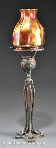 Appraisal: A Tiffany Favrile Glass and Patinated Bronze Candle Lamp c