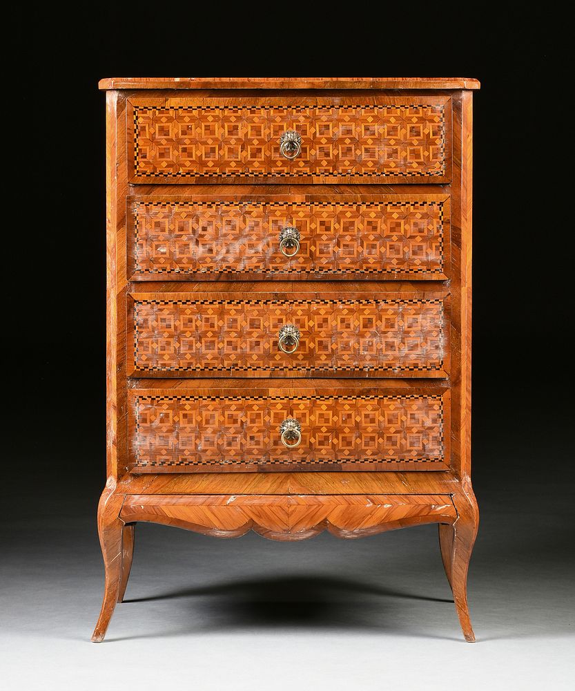 Appraisal: A GERMAN TULIPWOOD AND VARIOUS WOODS INLAID PARQUETRY CHEST OF