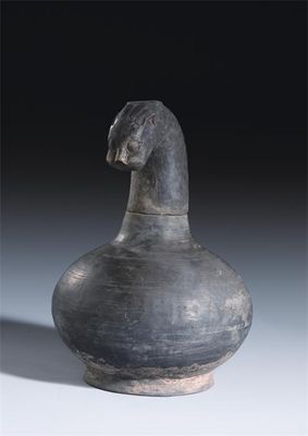 Appraisal: A Chinese black pottery zoomorphic jar and cover the finial