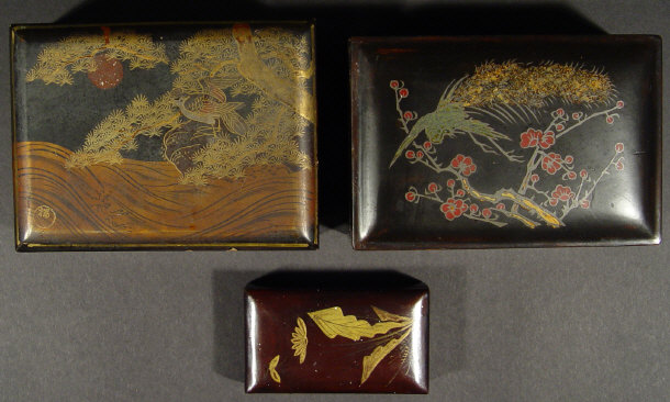 Appraisal: Three Japanese lacquer boxes each gilded and painted with flowers