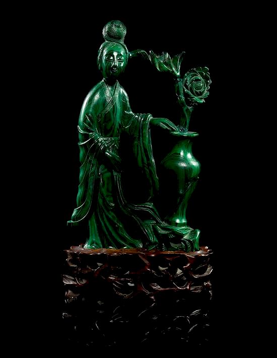 Appraisal: A Malachite Figure Height inches A Malachite Figure depicting a