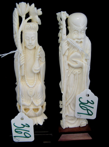 Appraisal: TWO CARVED CHINESE IVORY FIGURES a Man of Long Life