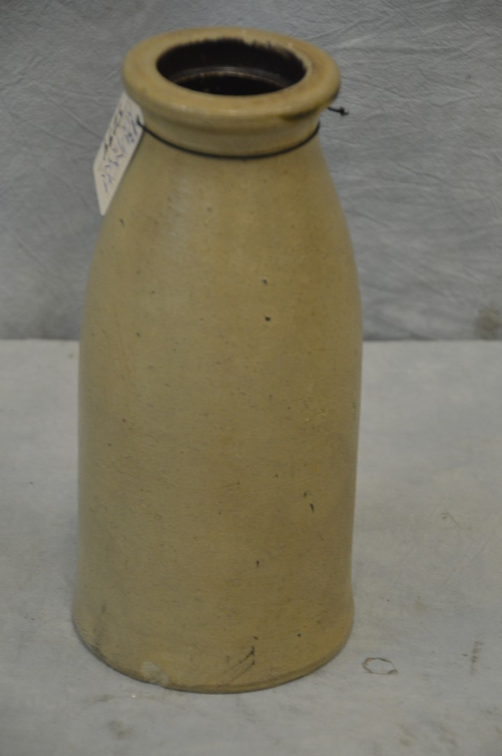 Appraisal: Stoneware milk bottle form jar th C Pennsylvania h x