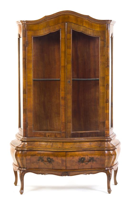 Appraisal: Sale Lot An Italian Walnut Veneered Display Cabinet the arched