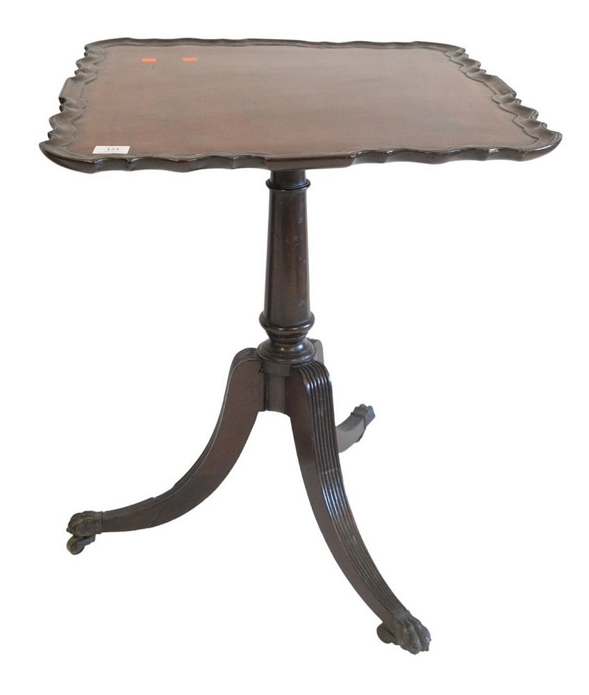 Appraisal: George II Mahogany Piecrust Tip Table on turned shaft on