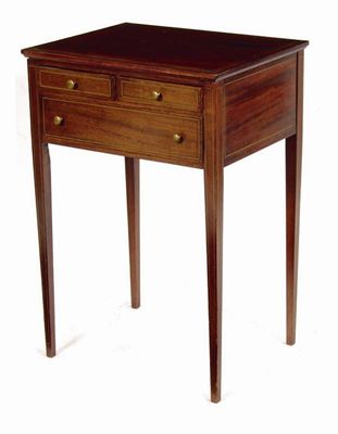 Appraisal: A mahogany side table inlaid brass stringing with two short