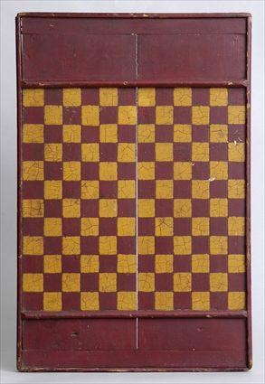 Appraisal: PAINTED WOOD CHECKERBOARD With alternating maroon and ochre squares banded