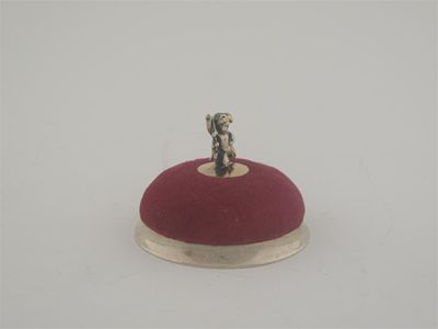 Appraisal: An early th century American silvergilt mounted pin cushion domed