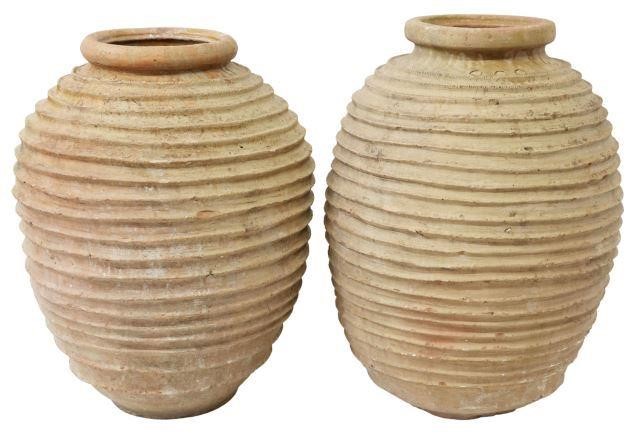 Appraisal: pair Large Continental terracotta olive jars rolled rim over ribbed