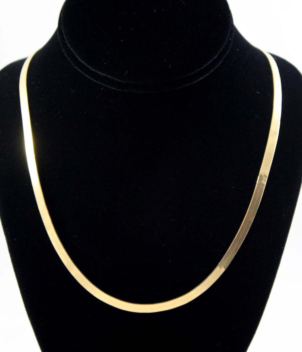 Appraisal: FOURTEEN KARAT GOLD HERRINGBONE NECK CHAIN mm wide length lobster