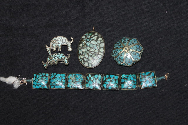 Appraisal: TWO BROOCHES of stylised elephants a pendant and a brooch