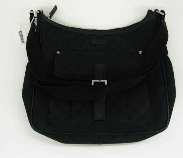 Appraisal: Gucci black canvas monogram hobo style bag with zip top