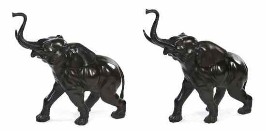 Appraisal: A Pair of Japanese Cast Bronze Elephants both depicted in