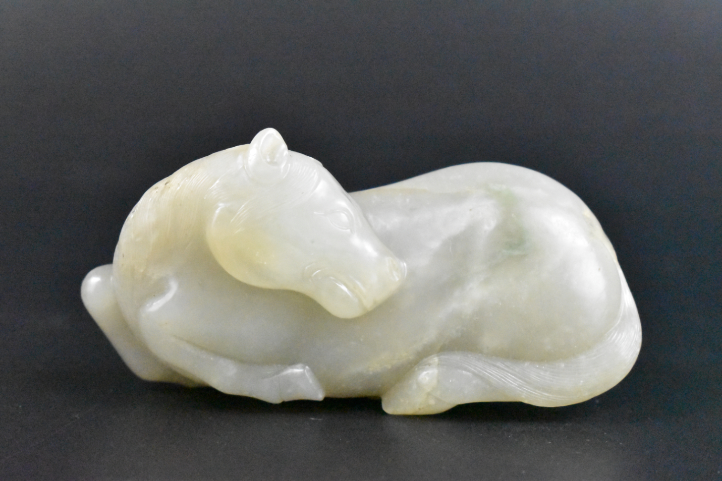 Appraisal: A Chinese jade carved horse dating from the th century