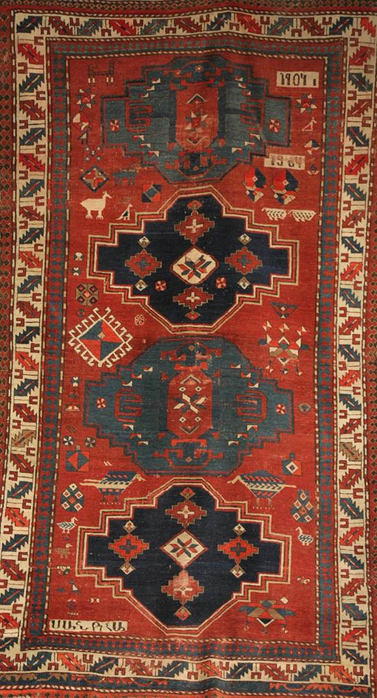 Appraisal: Kazak Rug Signed and Dated Red ground with stylized bird