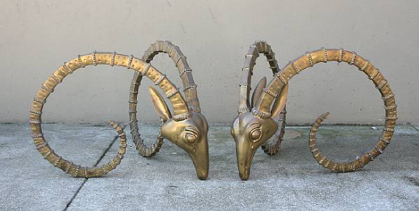 Appraisal: A pair of cast brass heads of antelope last quarter