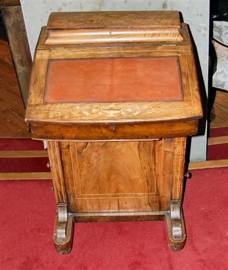 Appraisal: A Victorian mahogany and inlaid Davenport the sarcophagus top over