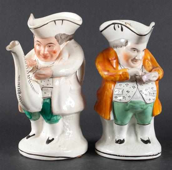 Appraisal: Staffordshire painted earthenware ''Snuff Taker'' toby jug and similar toby