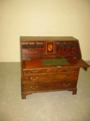 Appraisal: A GEORGE III MAHOGANY BUREAU the fall front with moulded