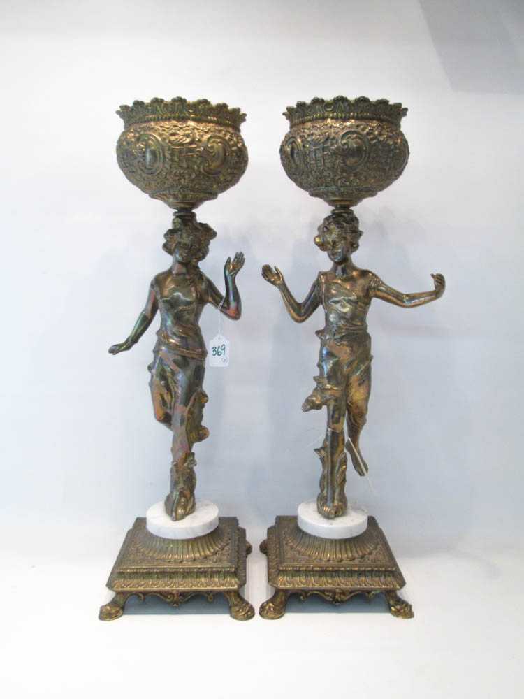 Appraisal: PAIR OF FIGURAL BRONZED STANDS having two classically garbed figures