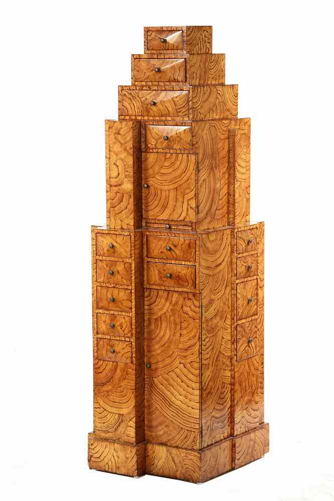 Appraisal: FAUX PAINTED TOWER OF DRAWERS - An Asymmetrical Glossy Faux