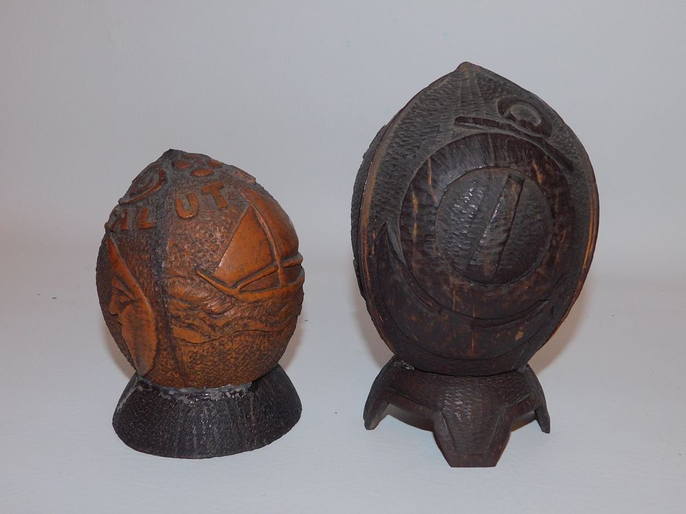 Appraisal: COCONUT SHELL BANKS Lot of two antique South Seas coconut