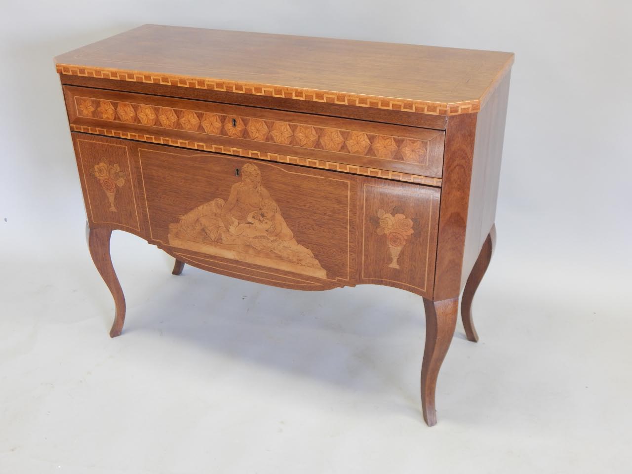 Appraisal: A Continental mahogany commode the rectangular top with canted corners