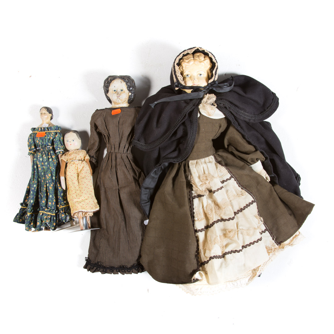 Appraisal: Assortment of carved wood and composition dolls