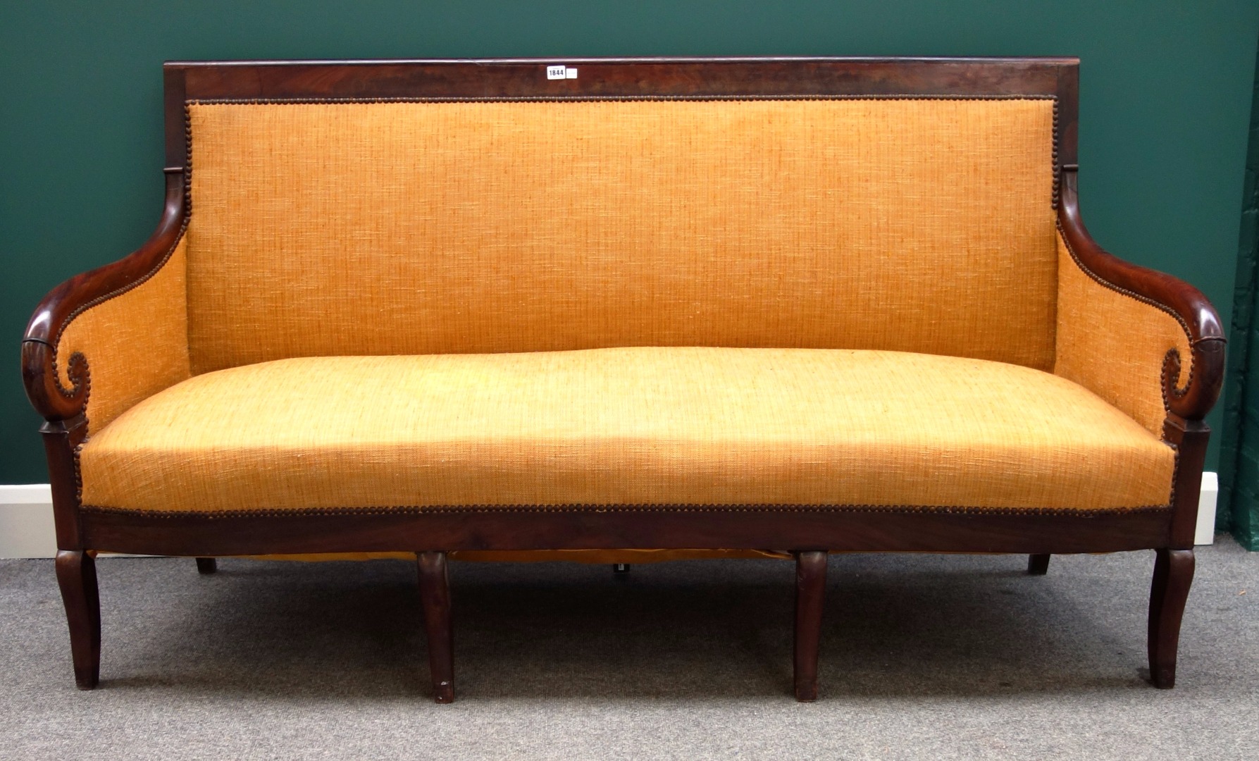 Appraisal: An early th century French mahogany framed sofa with bow