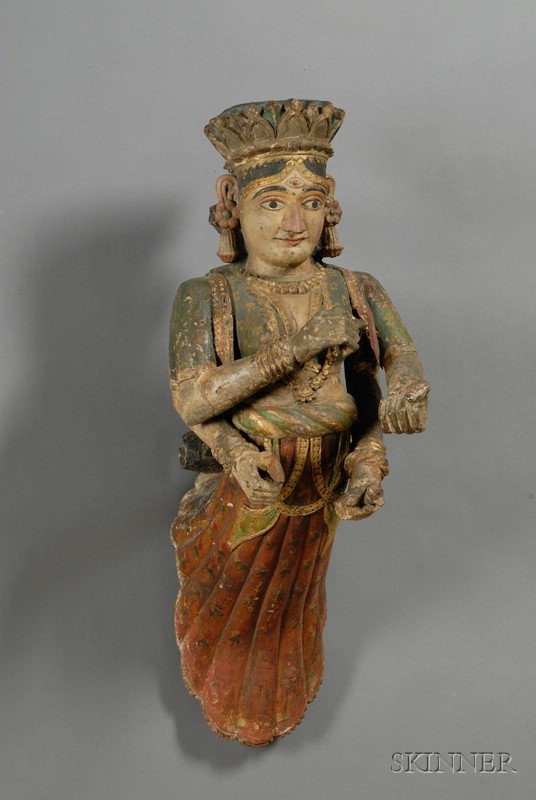 Appraisal: Carved Polychrome and Gilt Sculpture India th century four-armed figure