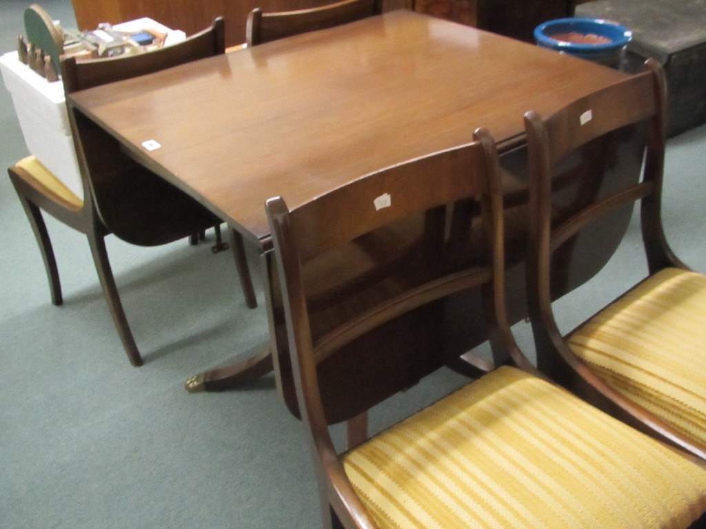 Appraisal: Reproduction drop leaf dining table with four chairs two cabinets