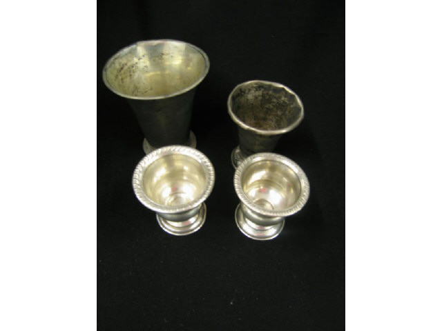 Appraisal: Pc Silver Lot sterling cigarette holders and European silver beakers