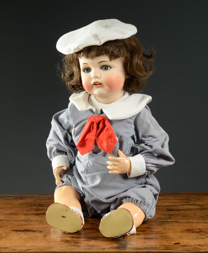 Appraisal: J D KESTNER GERMAN TODDLER DOLL with striking bisque socket