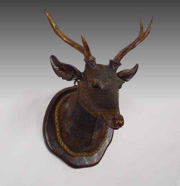 Appraisal: BLACK FOREST CARVED WALNUT DEER HEAD Natural antlers applied to