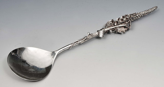 Appraisal: An Arts Crafts silver 'Hollyhock' spoon London assay maker's mark