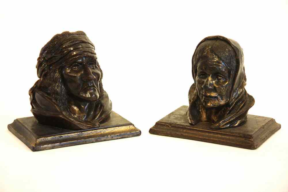 Appraisal: BUSTS - Pair bronze colored wax portraits of Native Americans