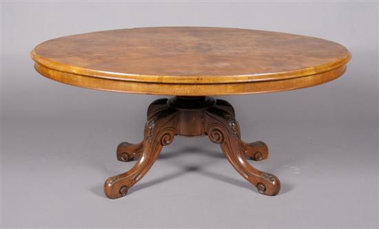 Appraisal: An Oval Burlwood Tilt-Top Low Table Height x width x