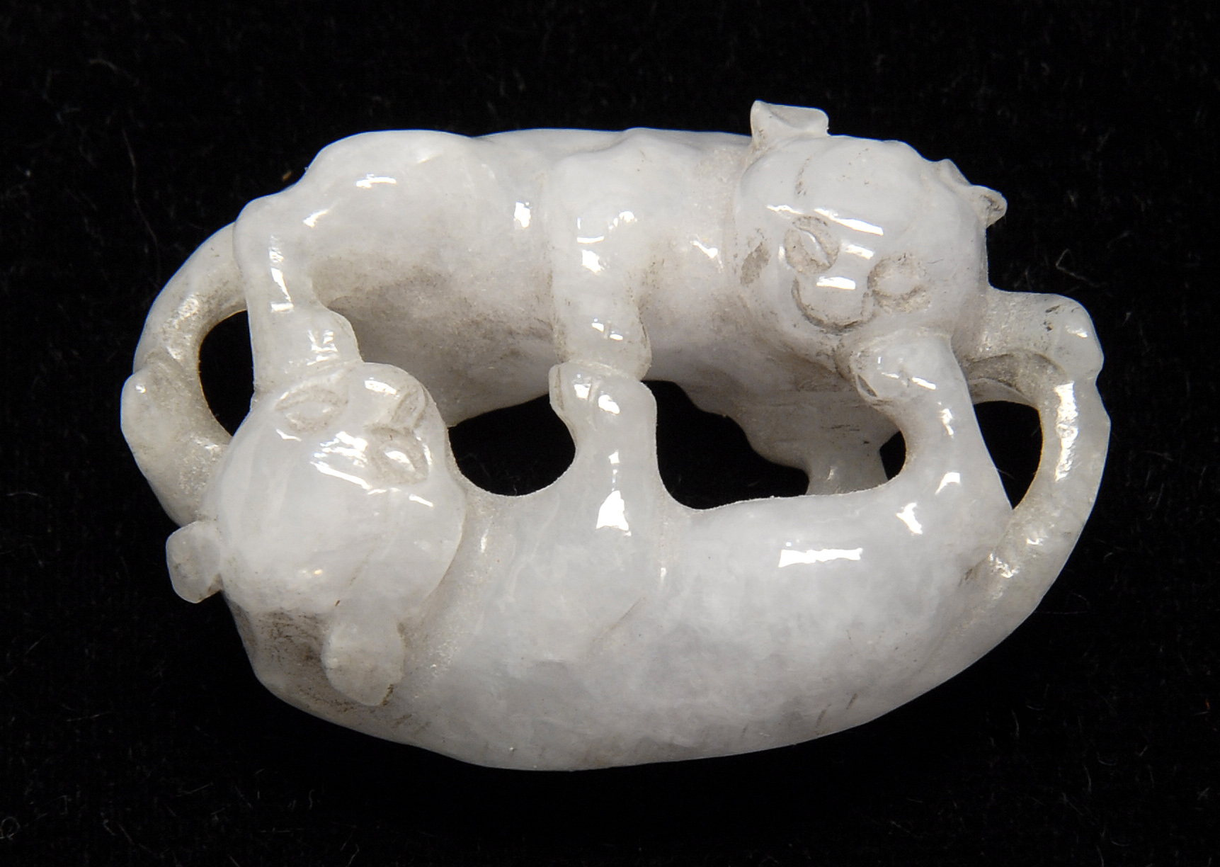 Appraisal: SMALL WHITE-GRAY JADE CARVING In the form of two playing