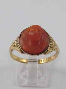 Appraisal: A coral cameo ring set in ct gold hallmarked London