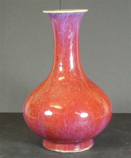 Appraisal: A Chinese flamb glazed bottle shaped vase cm high