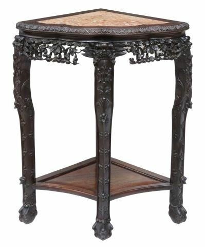 Appraisal: Chinese carved rosewood corner table having shaped inset marble top