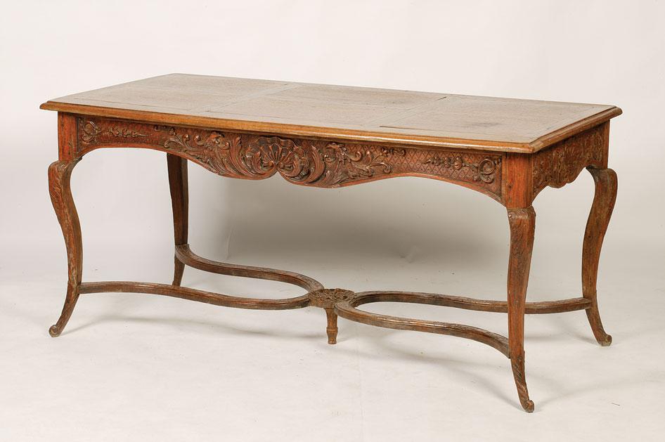 Appraisal: A LOUIS XVI OAK LIBRARY TABLE the rectangular panelled top