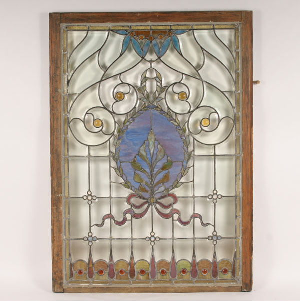 Appraisal: Leaded beveled window with lavender slag glass center medallion Framed