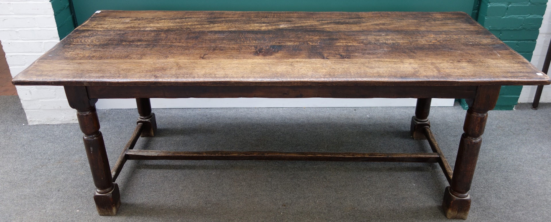 Appraisal: A th century style oak refectory table on turned supports