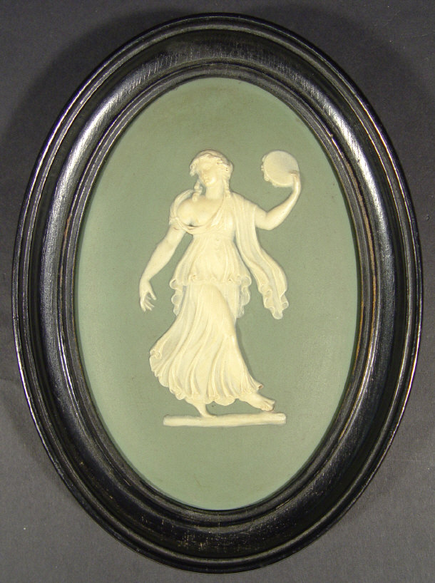 Appraisal: Wedgwood oval green Jasperware plaque in an ebonised frame relief