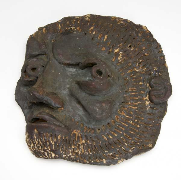 Appraisal: JAMES MELCHERT Hand-built stained ceramic wall-hanging Autumn Mask Provenance Carl