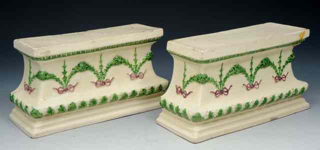 Appraisal: A PAIR OF CREAMWARE PEDESTALS circa with swag decoration old