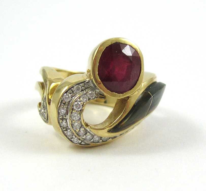 Appraisal: DIAMOND RUBY LABRADORITE AND EIGHTEEN KARAT GOLD RING oval-cut red